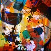 Colorful abstract art painting with splashes and dynamic brushstrokes.